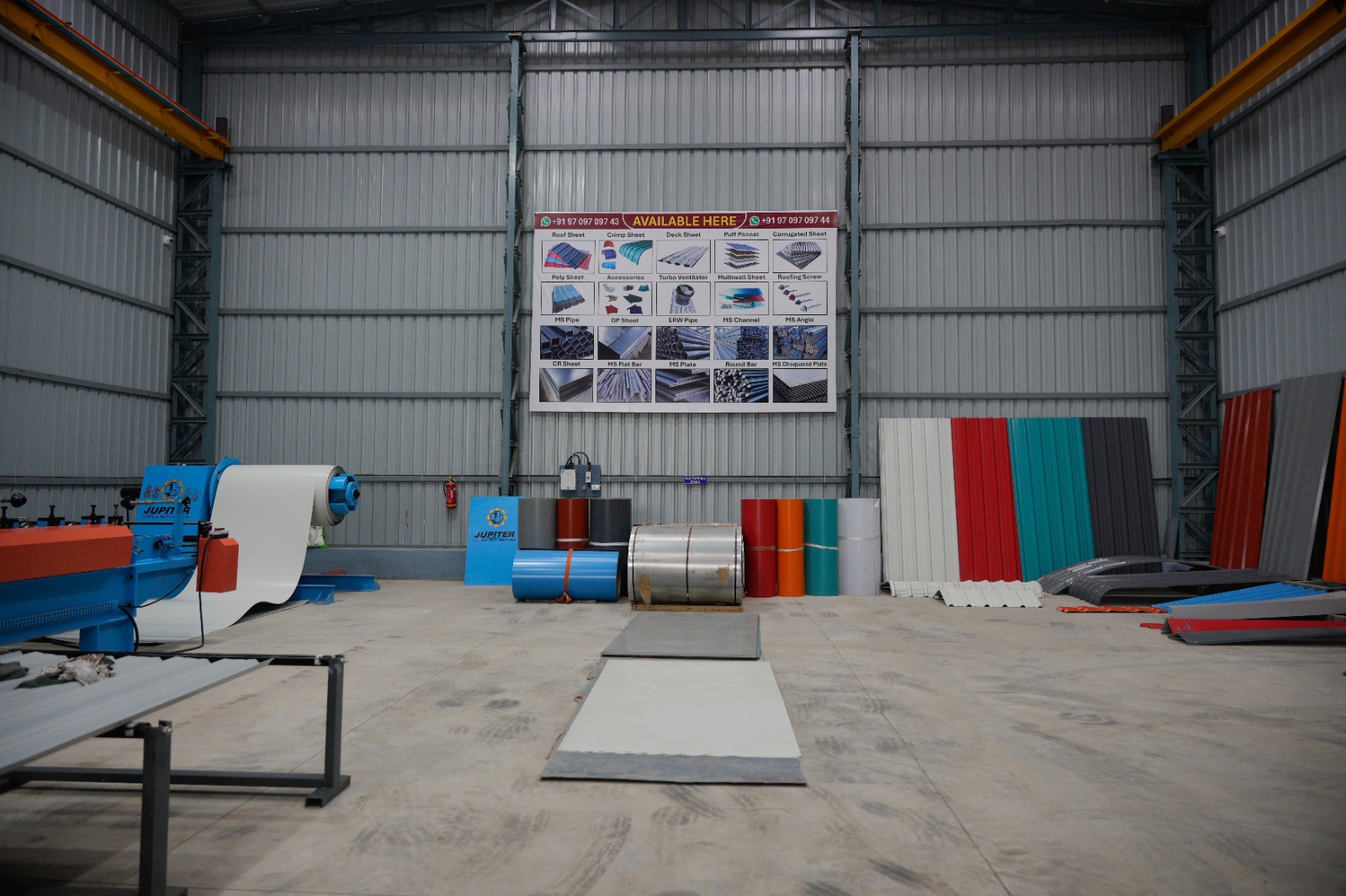 Warehouse with colour-coated coils and roofing sheet samples